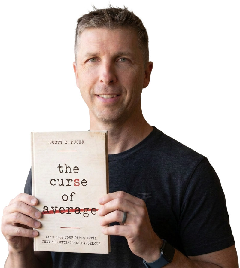 Scott E. Pucek holding The Curse of Average